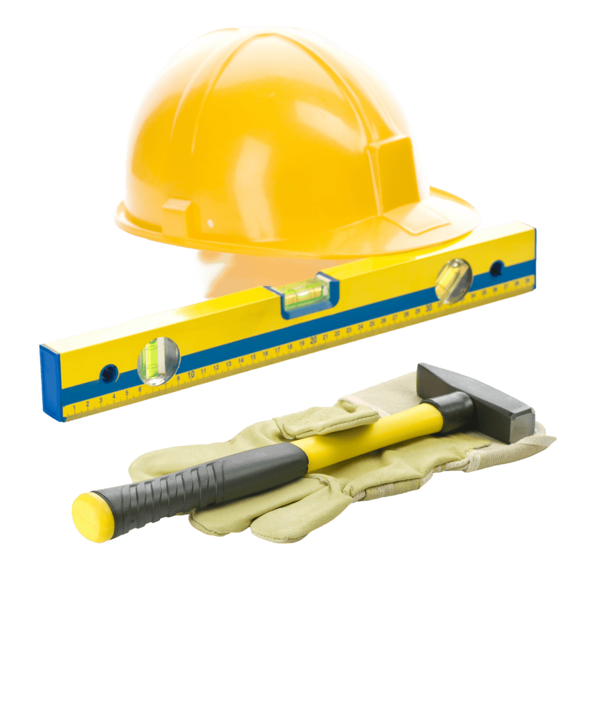 Yellow safety helmet, level, and hammer for construction work.